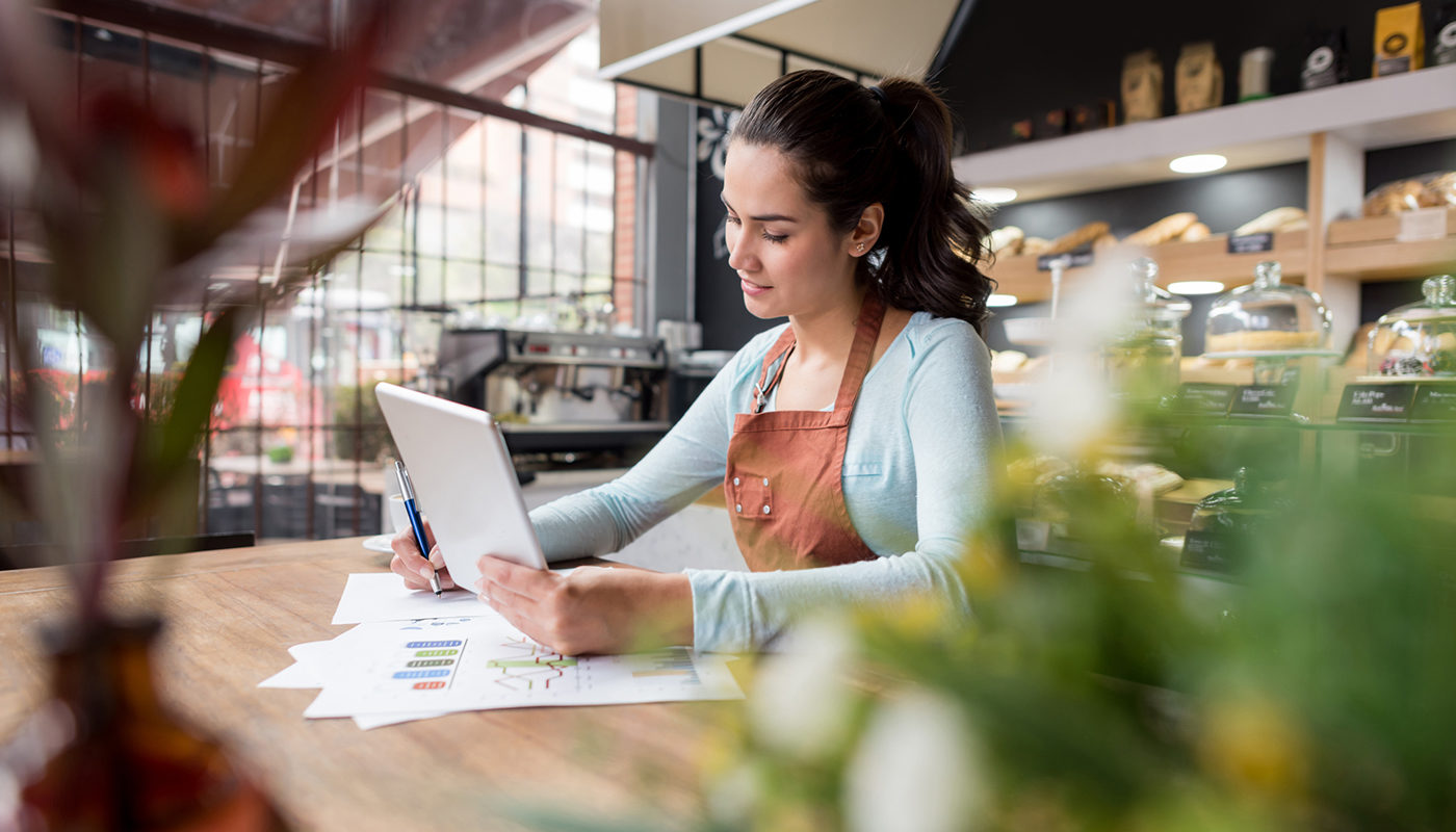 woman writing a business plan
